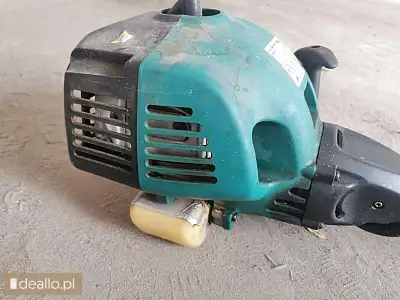 [eLicytacje]  - Kosa spalinowa marki Ogród Plus model BS26. Rok produkcji 2006. Stan techniczny niez - DEALLO.PL