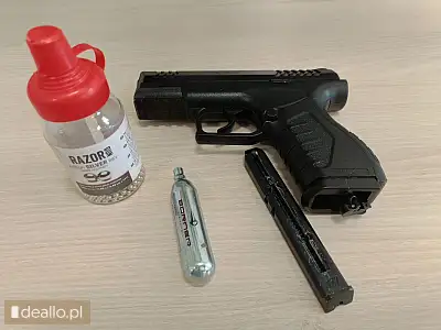 [eLicytacje] II licytacja - pistolet pneumatyczny firmy XBG kaliber 4,5 mm koloru czarnego, zasobnik - DEALLO.PL