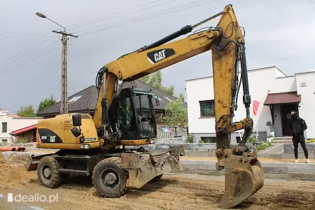 [elicytacje] ii licytacja - koparka kołowa caterpillar m 315d - POZNANIAK.NET